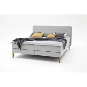 Světle šedá čalouněná dvoulůžková postel s matrací Meise Möbel Massello, 160 x 200 cm